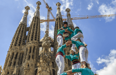 Visit Barcelona in April and see castellers in front of Sagrada Familia
